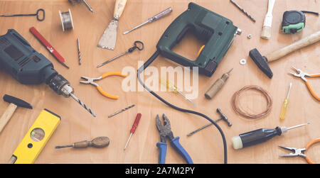 Various tools on wooden background - top view Stock Photo