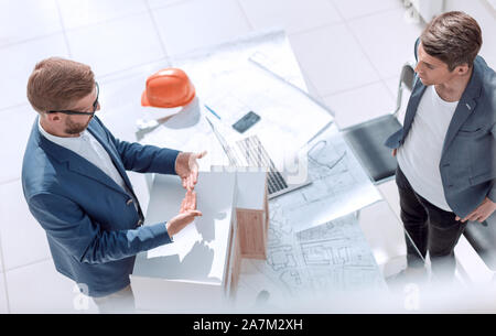 top view. employees of the architectural Bureau standing in the office Stock Photo