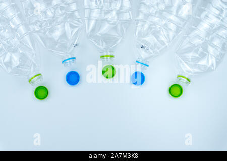 Recycling. The frame of used plastic bottle on white background with copy space. Recycle and reuse concept