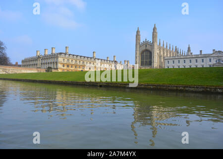 View across River Cam and The Back Lawn to King's College and King's College Chapel, low angle view from a punt on the water, University of Cambridge. Stock Photo