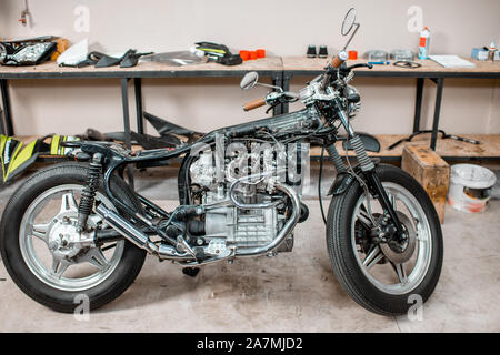Beautiful vintage motorcycle during a repairment in the workshop Stock Photo