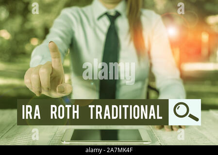 Handwriting text writing Ira Roth Traditional. Conceptual photo are tax deductible on both state and federal Female business person sitting by table a Stock Photo