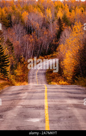 Mountain Road with Fall Foliage Alberta Canada Stock Photo