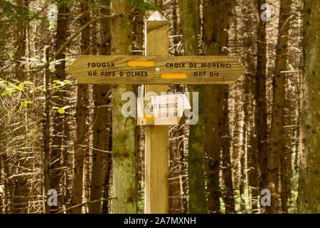 Wooden footpath signpost indicating Grand Randonee paths in the French Pyrenees Stock Photo