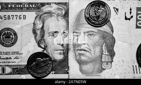 Black and white picture of USA money note vs Mexican money Stock Photo