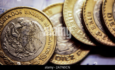 Panoramic closeup view of Mexican coins. Business and finance concept. Selective focus Stock Photo