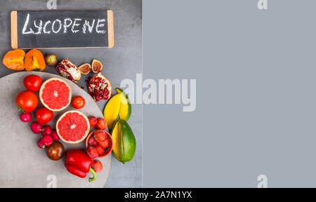 Fruits and vegetables containing lycopene. Healthy vegan food background. Lycopene is a red carotenoid pigment Stock Photo