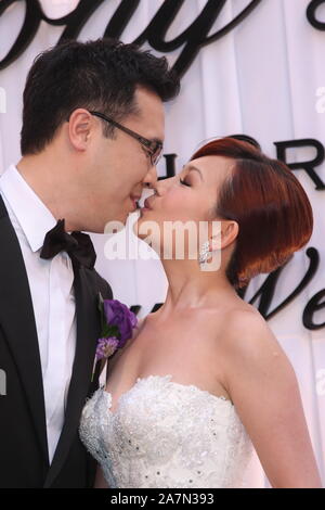 **TAIWAN OUT**--FILE--Malaysian singer Fish Leong and her husband Tony Chao attend their wedding in Taipei, Taiwan, 3 March 2010. Stock Photo