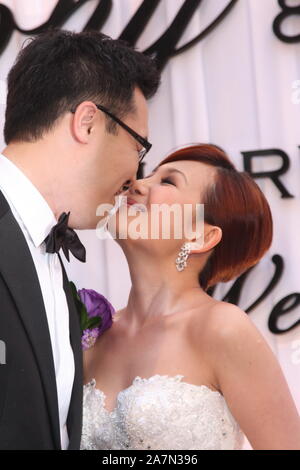 **TAIWAN OUT**--FILE--Malaysian singer Fish Leong and her husband Tony Chao attend their wedding in Taipei, Taiwan, 3 March 2010. Stock Photo