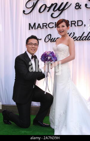 **TAIWAN OUT**--FILE--Malaysian singer Fish Leong and her husband Tony Chao attend their wedding in Taipei, Taiwan, 3 March 2010. Stock Photo