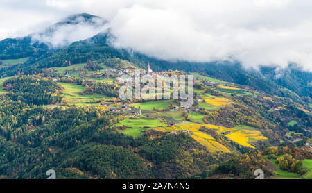 Panoramic autumn view with Tiso village, Province of Bolzano, Trentino Alto Adige, Italy. Stock Photo