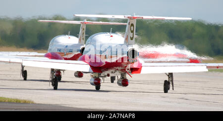 Aircraft of the Royal Canadian Air Force Snowbirds Demonstration Team taxi out to the runway in preparation for their flying display at Airshow London. Stock Photo