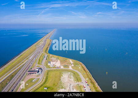 Afsluitdijk, a major dam and causeway in the Netherlands, runs from Den Oever in North Holland to village of Zurich in Friesland province, damming off Stock Photo