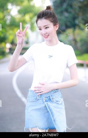 Chinese actress Qiao Xin, also known as Bridgette Qiao, poses before attending a press conference to release Huawei x Gentle Monster smart glasses in Stock Photo