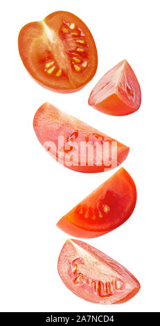 Vibrant falling vegetables isolated on white background Stock Photo