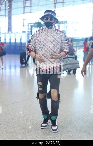 Taiwanese singer and actor Jiro Wang arrives at a Beijing airport before  departure in Beijing, China, 19 November 2019. Jacket: Louis Vuitton Bag  Stock Photo - Alamy