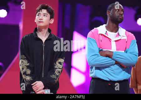 Dwyane Wade, right, and Bai Jingting, left, participate into the Chinese variety show, Dunk of China, in Beijing China, 20 August 2019. Dwyane Wade, a Stock Photo