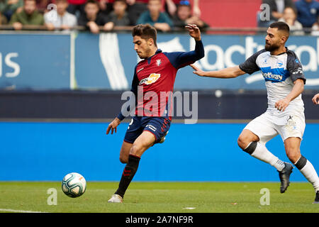 Nacho Vidal (defender; CA Osasuna) and Aleix Vidal (midfield; Deportivo Alavés) are seen in action during the Spanish football of La Liga Santander, match between CA Osasuna and Deportivo Alavés at the Sadar stadium, in Pamplona.(Final score; CA Osasuna 4:2 Deportivo Alavés) Stock Photo