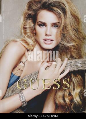 poster advertising GUESS with Vanessa Hessler in paper magazine from 2010 year, advertisement, creative GUESS advert from 2010s Stock Photo