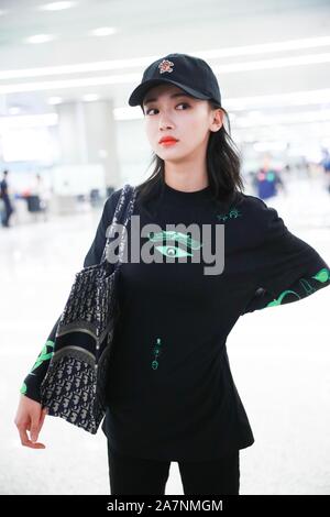 Chinese actress Wu Jiyan appears at an airport in Shanghai, China, 29 August 2019. Undershirt: Marine Serre Shorts: Rta Boots: Timberland Bag: Dior ** Stock Photo