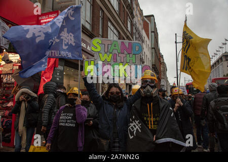 London, UK. 2nd November, 2019. Protesters seen in Oxford Street, London, in support of the anti-protests in Hong Kong. Credit: Joe Kuis / Alamy News Stock Photo