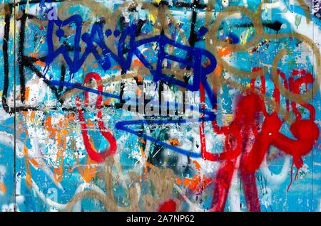 Close-up of a multi- colored vibrant graffiti on wall Stock Photo