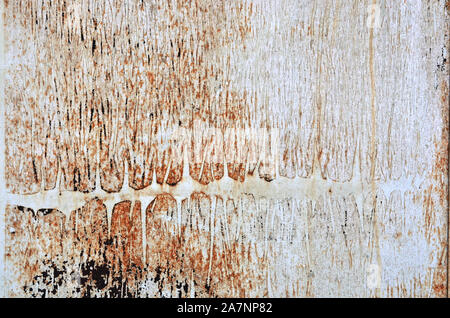 Close-up shot of a old rusty piece of billboard .Textured empty abandoned street advertising panel. Stock Photo