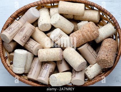 High angle view of cork stoppers   in a wood  basket. Stock Photo