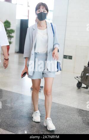 Chinese actress and singer Ye Yiqian arrives at the Beijing Capital ...