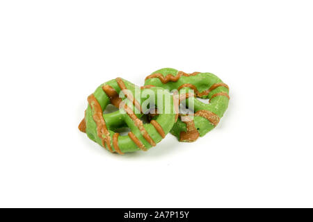 Brown and green caramel apple pretzel treats Stock Photo