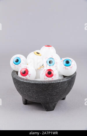 Spooky plastic multicolored eye  pieces in a bowl Stock Photo