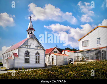 Street view of St. Mary's Church and quaint wooden residential houses in downtown Stanley, the capital of the Falkland Islands (Islas Malvinas). Stock Photo