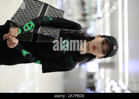 Chinese actress Wu Jiyan appears at an airport in Shanghai, China, 29 August 2019.   Undershirt: Marine Serre  Shorts: Rta  Boots: Timberland  Bag: Di Stock Photo