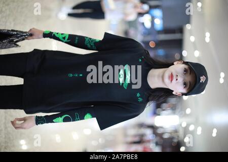 Chinese actress Wu Jiyan appears at an airport in Shanghai, China, 29 August 2019.   Undershirt: Marine Serre  Shorts: Rta  Boots: Timberland  Bag: Di Stock Photo