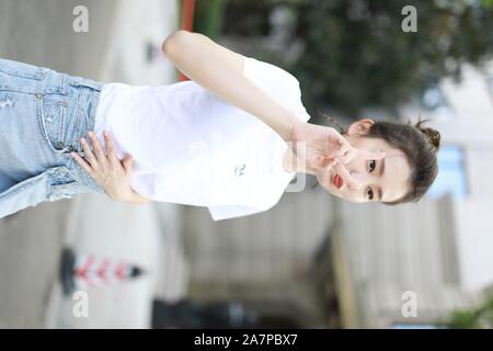 Chinese actress Qiao Xin, also known as Bridgette Qiao, poses before attending a press conference to release Huawei x Gentle Monster smart glasses in Stock Photo