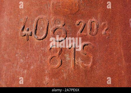 Rusted iron with numbers Stock Photo