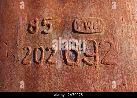 Rusted iron with numbers Stock Photo