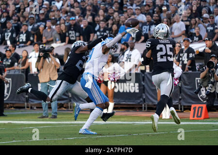 Oakland Raiders cornerback Nevin Lawson (26) returns a kickoff during the  first half of an NFL …