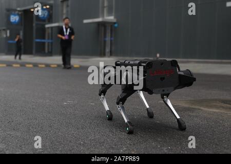 A four-legged robot dog called 'Laikago' developed by Unitree is displayed during the 2019 Word Robot Conference (WRC) in Beijing, China, 20 August 20 Stock Photo