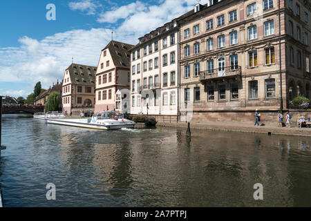 Strasbourg, Bas-Rhin / France - 10 August 2019: Strasbourg canals with boats ready for sightseeing cruises through the old town Stock Photo