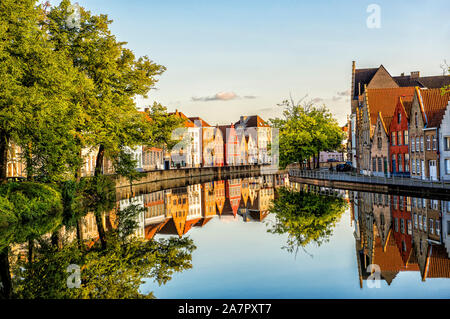 Stunning Reflections in the Canal of Nearby Homes, Bruges, Belgium Stock Photo