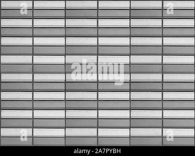 random weathered old dark black cement brick blocks stack wall texture surface background. Stock Photo