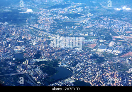 --FILE--This photo taken from a jet plane shows the high-rising buildings in Shenzhen city, south China's Guangdong province, 25 June 2017.   China wi Stock Photo