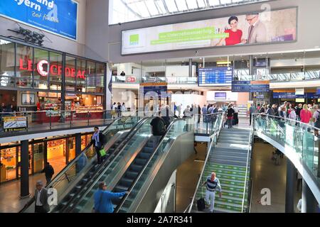 NUREMBERG, GERMANY - MAY 6, 2018: Passengers visit Nuremberg Central Station (Hauptbahnhof), Germany. Nuremberg is located in Middle Franconia. 511,62 Stock Photo