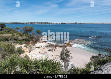 Looking across Port Hacking to Cronulla from Little Jibbon Beach at Bundeena in southern Sydney, Australia Stock Photo