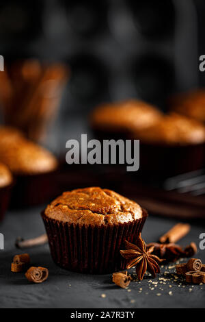 Cinnamon muffins on black background Stock Photo