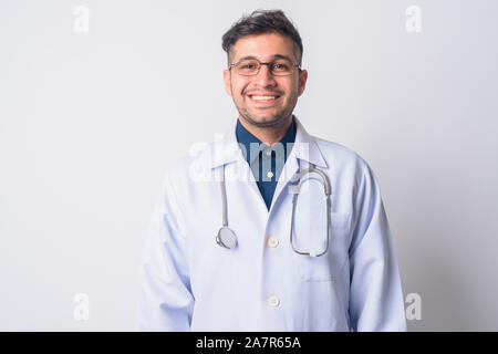 Portrait of happy Persian man doctor smiling Stock Photo