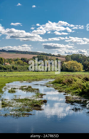 Flooded Cuckmere River. Shot from a bridge on the public footpath called the South Downs Way. Just outside the pretty village of Alfriston in Sussex. Stock Photo