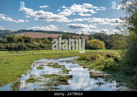 Flooded Cuckmere River. Shot from a bridge on the public footpath called the South Downs Way. Just outside the pretty village of Alfriston in Sussex. Stock Photo
