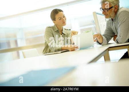 Informal business meeting between work colleagues Stock Photo